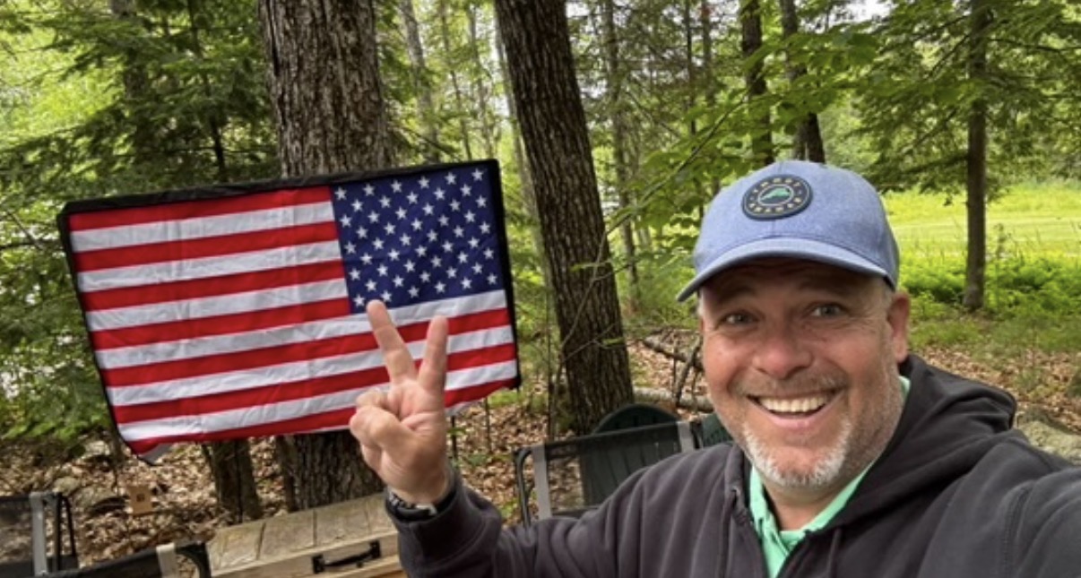 Father's Day weekend at Sebago Lake — flags up, family in, and the lake calling.