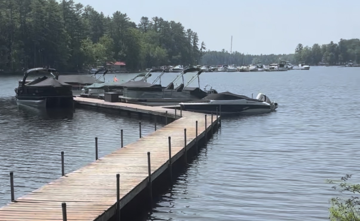 Floating dock in May sitting nearly level as Sebago Lake is near its seasonal high water level