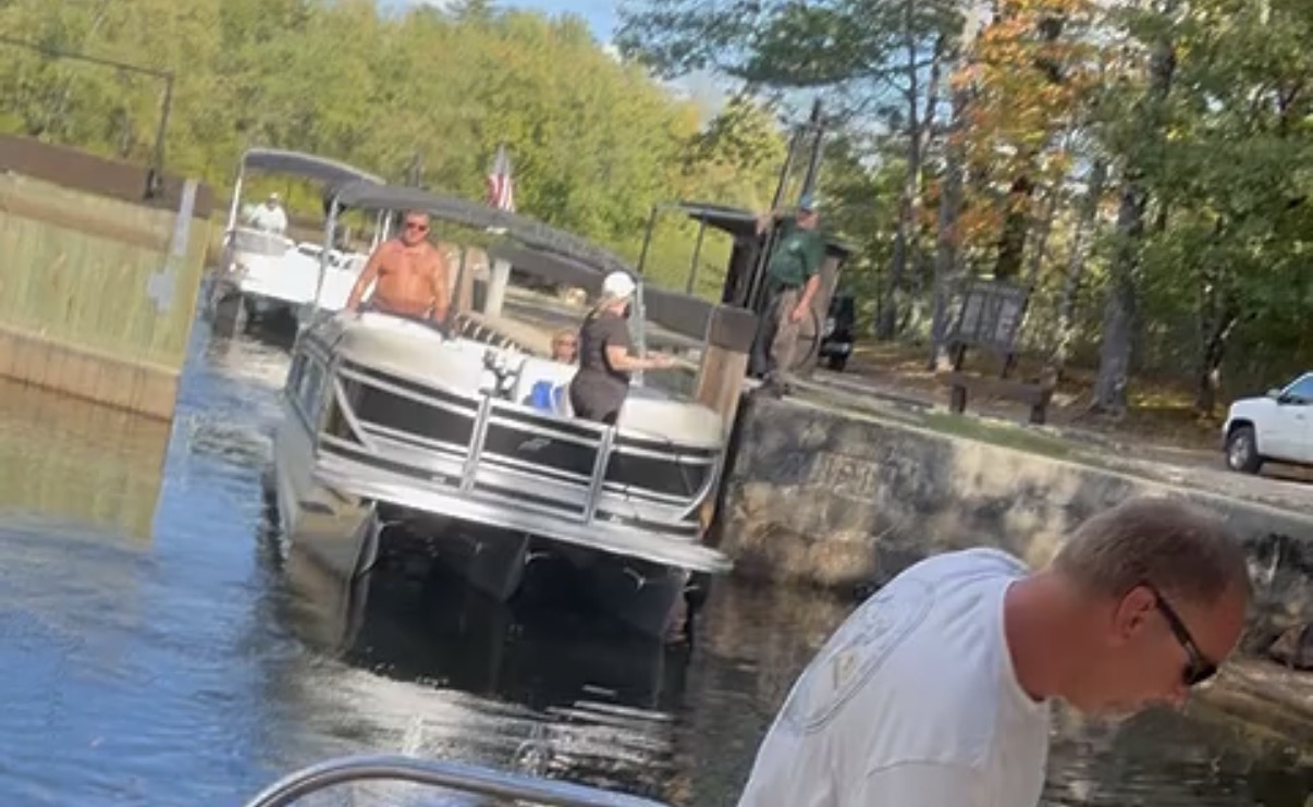 Boats traveling through Songo Lock in Naples Maine