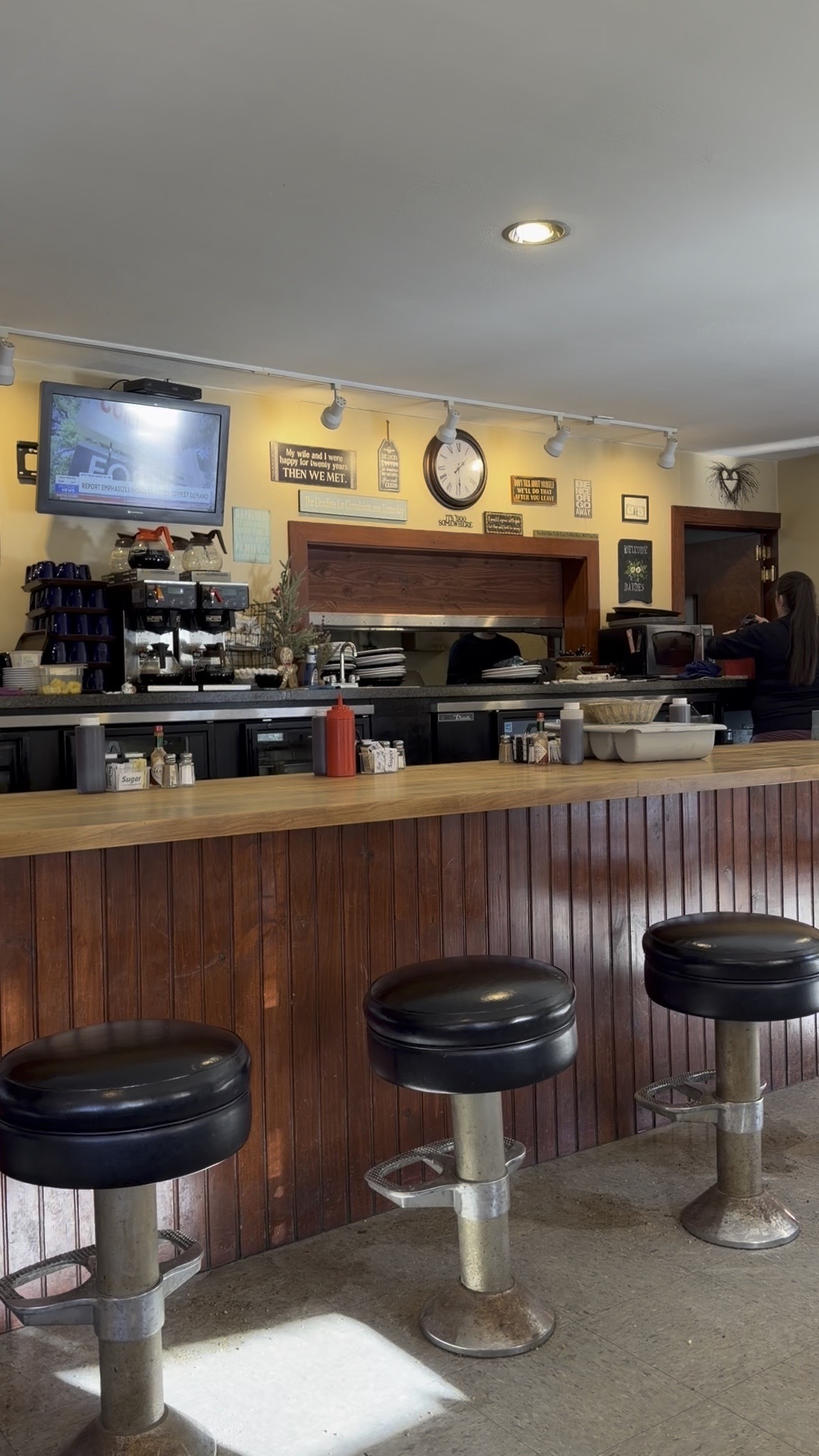 Counter seating and kitchen at Top of the Hill Grille